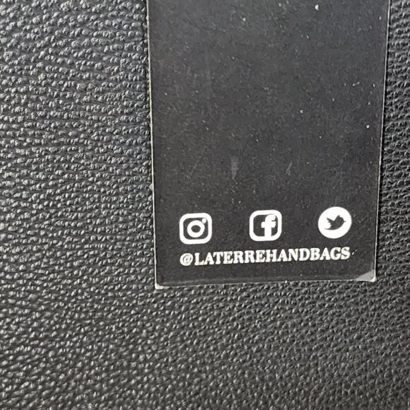 La Terre Black Peta Apprvd Vegan Braided Handle Gold Accent Feet Handbag w/Strap - Picture 6 of 16